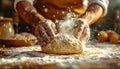 Baker Kneading Dough in Rustic Kitchen Setting Royalty Free Stock Photo