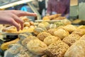 Close-up of bakery pastry shop display with fresh buns Royalty Free Stock Photo