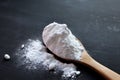 Close-up of baking soda, Bicarbonate of soda on wooden spoon. Royalty Free Stock Photo