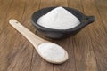 Baking soda sodium bicarbonate in a wooden spoon Royalty Free Stock Photo