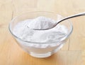 Close-up of baking soda on spoon. Royalty Free Stock Photo