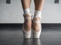 Close Up Of A Ballet Dancer`s Bare Feet In Pointe Shoes