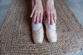 Close-Up of Ballet Dancers Feet in pointe on Textured Mat. Detailed view of ballet dancers feet Royalty Free Stock Photo