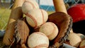 Close up on balls, a glove and bats of baseball Royalty Free Stock Photo