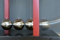 Close up 5 Balls Pendulum, chrome Newton`s cradle Royalty Free Stock Photo