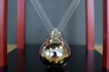 Close up 5 Balls Pendulum, chrome Newton`s cradle Royalty Free Stock Photo