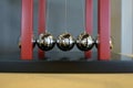 Close up 5 Balls Pendulum, chrome Newton`s cradle Royalty Free Stock Photo