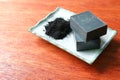 Close up bamboo charcoal melt and pour soap bars