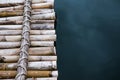 Close-up bamboo raft on the water