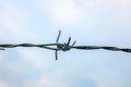 Close up barbed wire on sky background Royalty Free Stock Photo