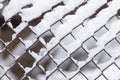 Close-up of barbwire covered by snow