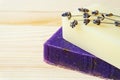 Close-up of bars of handmade soap with lavender flowers.