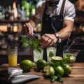 A close-up of a bartenders hands muddling ingredients for a mojito4