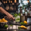 A close-up of a bartenders hands muddling ingredients for a mojito2 Royalty Free Stock Photo