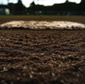 Close up of baseball diamond pic with white base and lines Royalty Free Stock Photo