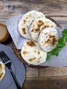 A close up of a basket of Baati roti for breakfast Royalty Free Stock Photo