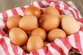 Close up of a basket of fresh raw Brown Eggs