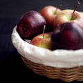 Close up of a basket of red apples. Conceptual image Royalty Free Stock Photo