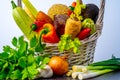 Close-up of basket with root vegetables and zucchini