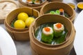 Baskets of dimsum, Chinese steamed food in bamboo basket
