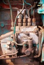 Close up of battered old farm tractor engine. Tractor machine Royalty Free Stock Photo