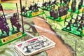 Close-up of Battle Masters strategy board game with playing cards and plastic model fantasy soldiers
