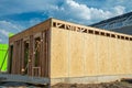 Close-up of beam built home under construction and blue sky with wooden truss, post and beam formwork timber frame house Royalty Free Stock Photo