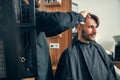 Close up of bearded man being in salon Royalty Free Stock Photo