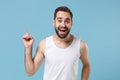 Close up bearded young man 20s years old perfect skin wearing white shirt isolated on blue pastel wall background Royalty Free Stock Photo