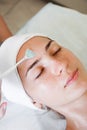 Close-up beautician doctor hand making anti-age procedure apply peeling acid Royalty Free Stock Photo