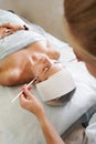 Close-up beautician doctor hand making anti-age procedure apply peeling acid Royalty Free Stock Photo