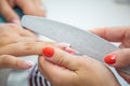 Close up of Beautician Emery Nail File in Beauty Manicure Salon