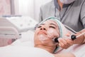 Beauty treatment using radio frequency equipment Royalty Free Stock Photo