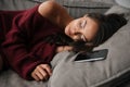 Close up of a beautiful asian woman in sweater sleeping Royalty Free Stock Photo