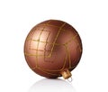 Close-up of beautiful bronze christmas ball with glittering pattern