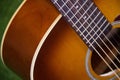 Close up of a beautiful and classic acoustic guitar