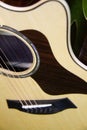 Close up of a beautiful and classic acoustic guitar