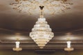 Close-up of a beautiful crystal chandelier Beautiful chandelier. luxury expensive chandelier hanging under ceiling. Royalty Free Stock Photo