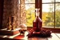 Close-up of beautiful crystal glass decanters with brandy or port wine and glasses on a wooden table