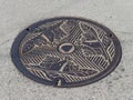 Close-up of Beautiful Decorative Manhole Cover / Sewer Cap.