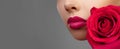 Lips with bright lipgloss makeup. Perfect clean skin, fresh lip make-up. Beautiful spa with tender pink rose flower Royalty Free Stock Photo