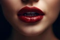 Close up of beautiful female lips. Glossy, healthy colored lips. Half open