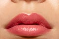 Close up beautiful female lips with pink lipgloss Royalty Free Stock Photo