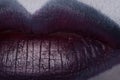 Close up of beautiful full woman lips with purple makeup Royalty Free Stock Photo