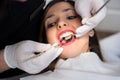 Close up of beautiful girl having dental check up in dental clinic Royalty Free Stock Photo