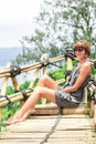 Close-up of beautiful girl posing in tropical forest of magic island Bali, Indonesia. Royalty Free Stock Photo