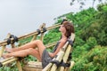 Close-up of beautiful girl posing in tropical forest of magic island Bali, Indonesia. Royalty Free Stock Photo