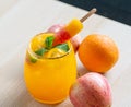 Beautiful glass of fruity coctail decorated with colorful iced Royalty Free Stock Photo