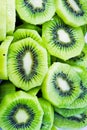 Close up of beautiful kiwi fruit slices background