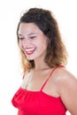 Beautiful laughing curly girl smiling against white background